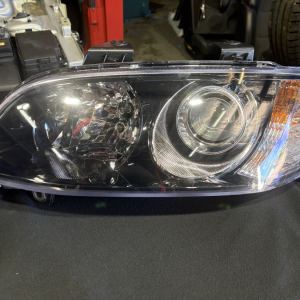 As new Genuine VE 2 SSV Calais LH Projector headlight